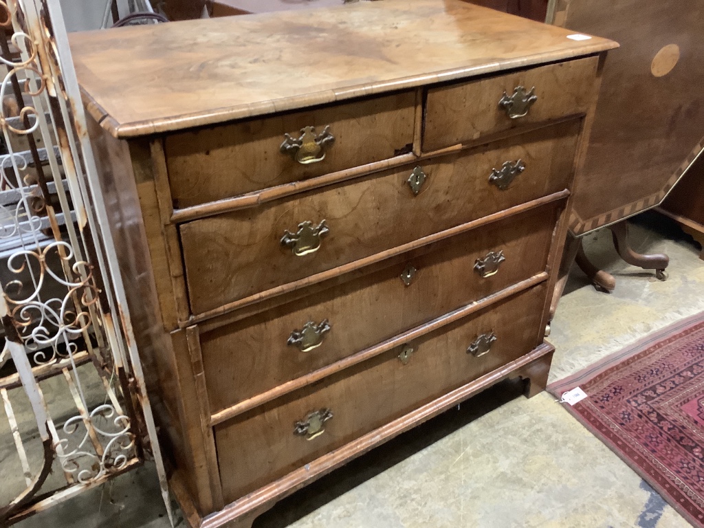 A William and Mary walnut and oak inlaid chest, in two parts, width 101cm, depth 56cm, height 97cm